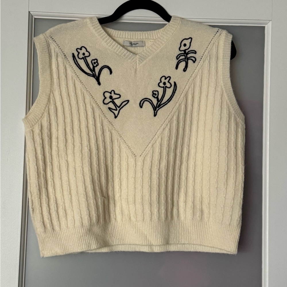 Cream vest with floral embroidery